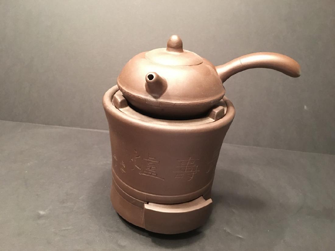 A Fine Chinese Zisha teapot on a Furnace, 5 1/2" wide, (1 of 9)