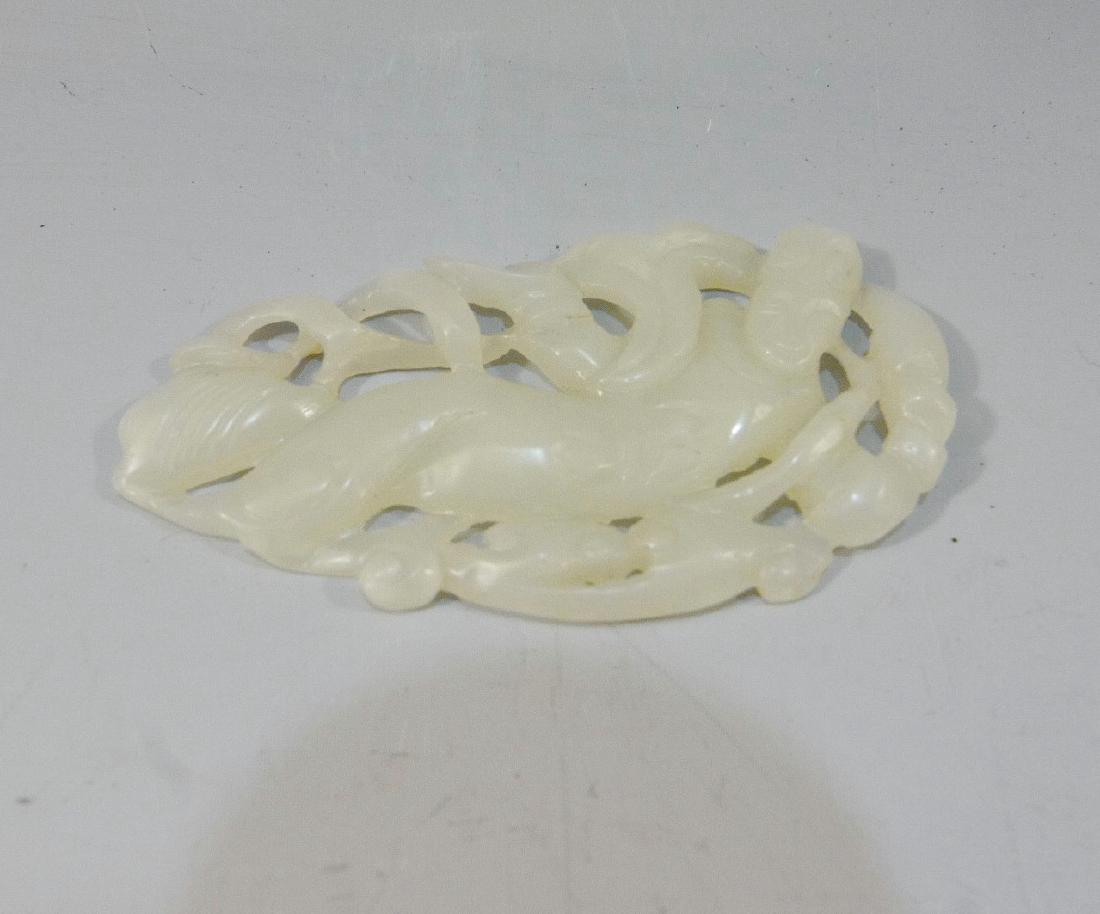 CHINESE ANTIQUE CARVED JADE FLYING DEITY - 18TH CENTURY: CHINESE ANTIQUE CARVED JADE FLYING DEITY - 18TH CENTURY. 7 CM WIDE. 17 GRAMS. PROVENANCE - POTOMAC MD ESTATE