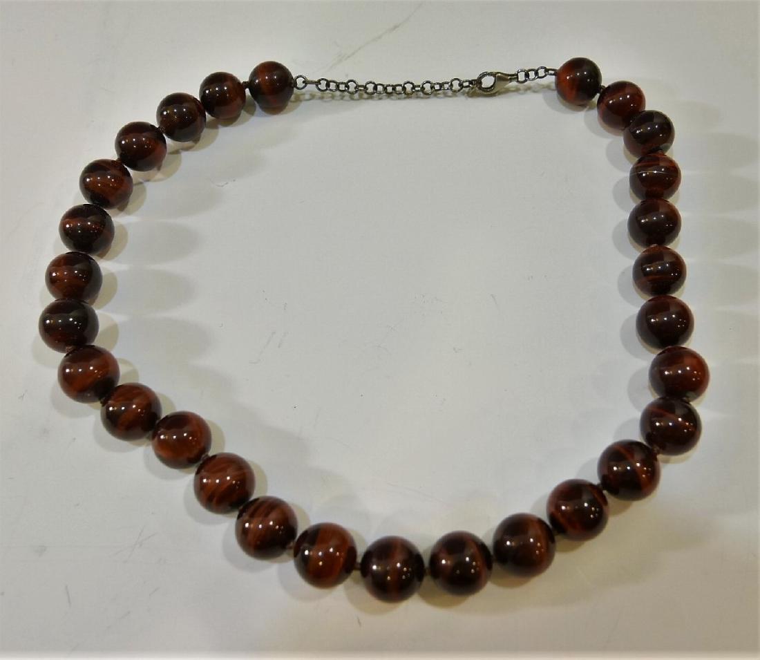 LARGE CAT'S EYE BEADS NECKLACE: LARGE CAT'S EYE BEADS NECKLACE. 115 GRAMS. 45 CM LONG. 14MM BEADS. ALL GEMSTONE GUARANTEED NATURAL UNENHANCED.