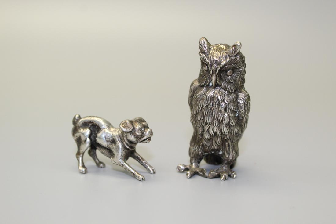 Two metal animal figurines. (1 of 2)