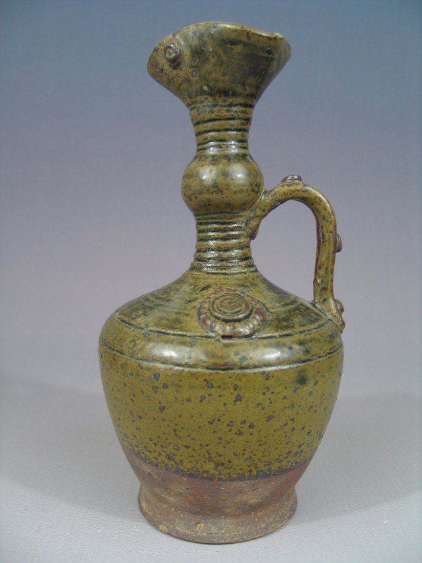 Chinese Earthenware Pitcher, Possibly Tang Dynasty: A very rare Chinese earthenware pitcher, possibly Tang Dynasty. Size: H 8 1/4 in. Biggest Dia: 4 1/4 in.