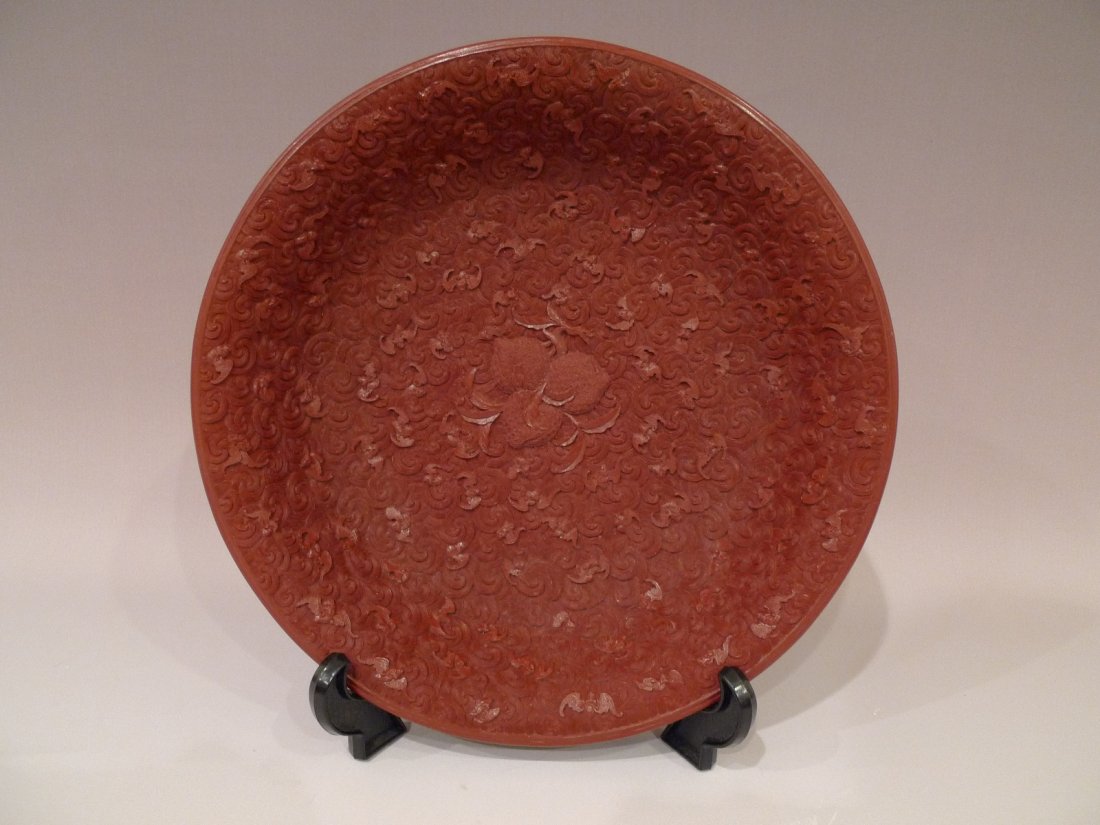 LARGE CHINESE CARVED RED LACQUER PLATE. QIANLONG MARK: Vintage 1970s official reproduction by the National Palace Museum in Taiwan where the real item is a national treasure on exhibit. This plate is a truthful representation of the original item and was 