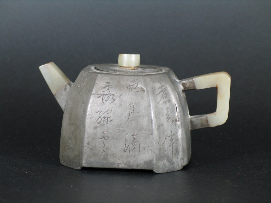 Antique Chinese Tin Teapot: Antique Chinese Tin Teapot, jade handle, spout, and lid knob, Maker's mark inside the teapot. Total ht: 2 3/4 inches.