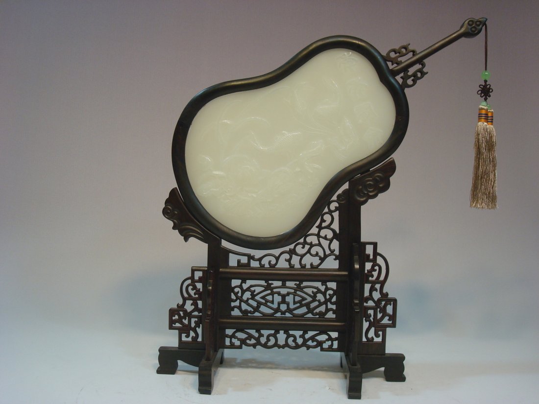 Antique Chinese White Jade Screen with Fish and lotus,: Antique Chinese White Jade Screen with Fish and lotus, 19th C. Size: Jade itself 9" Long x 6" wide. The frame is 15" high. Providence: American Asian Art Gallery
