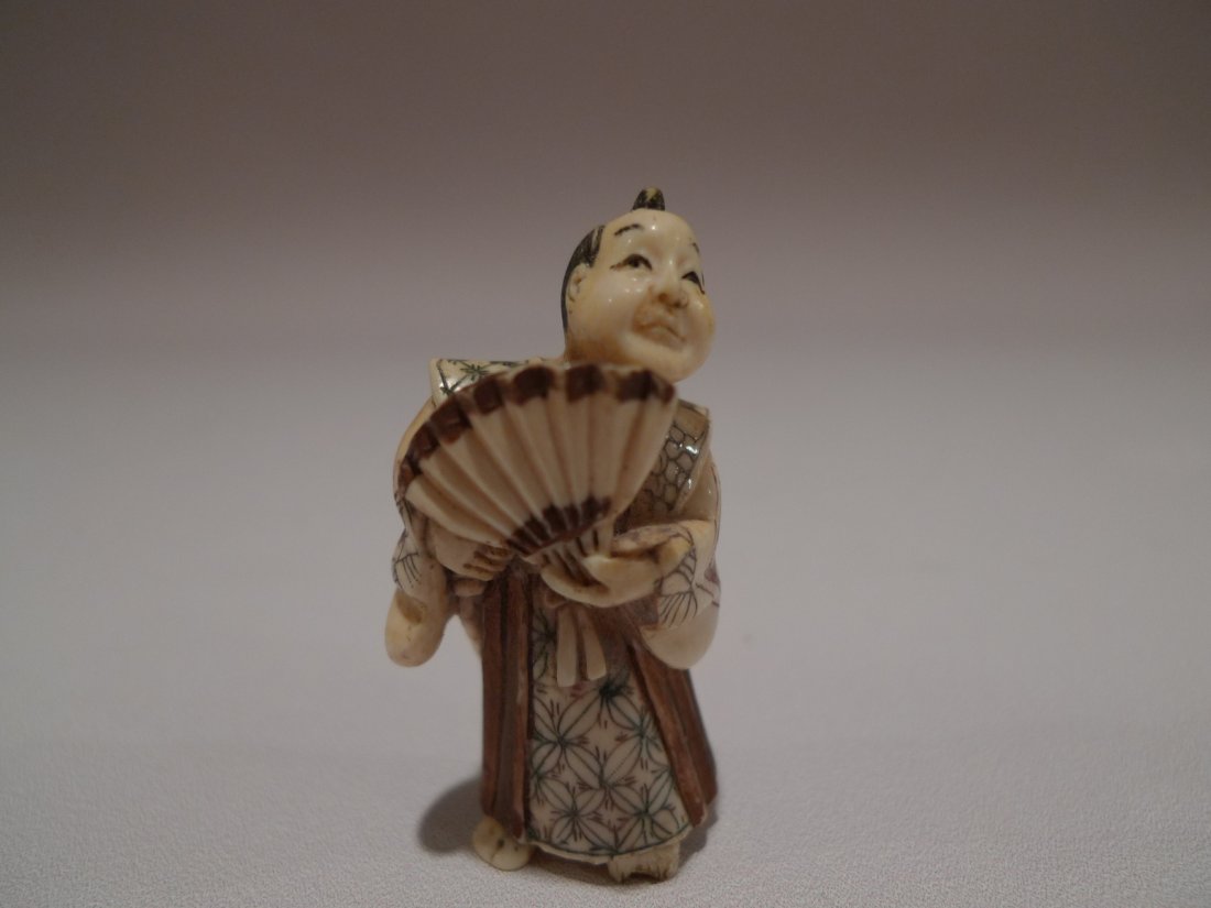 JAPANESE CARVED IVORY SAMURAI NETSUKE MEIJI PERIOD: JAPANESE CARVED IVORY SAMURAI NETSUKE MEIJI PERIOD. 2"