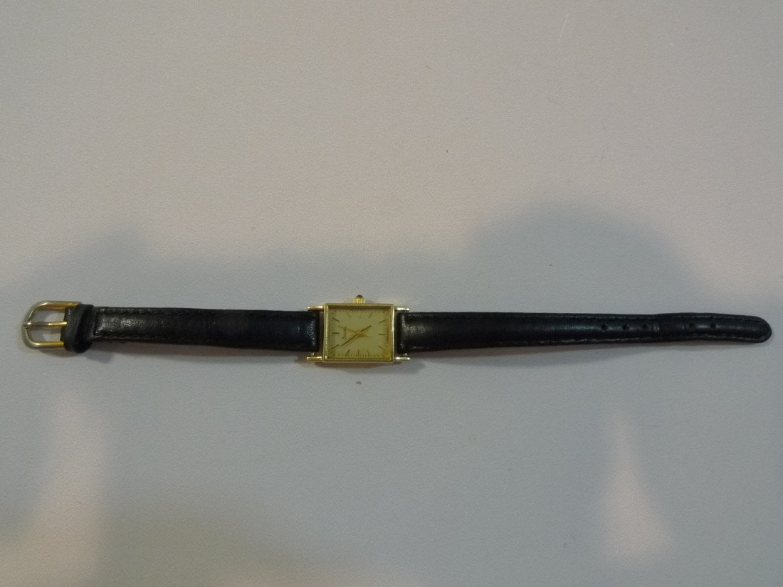 14K SOLID GOLD WOMEN'S GOLD BULOVA WATCH: WOMEN'S GOLD BULOVA WATCH. 14K SOLID GOLD CASE AND MARKED. QUARTZ MOVEMENT. NEED BATTERY. GOOD LEATHER STRAP