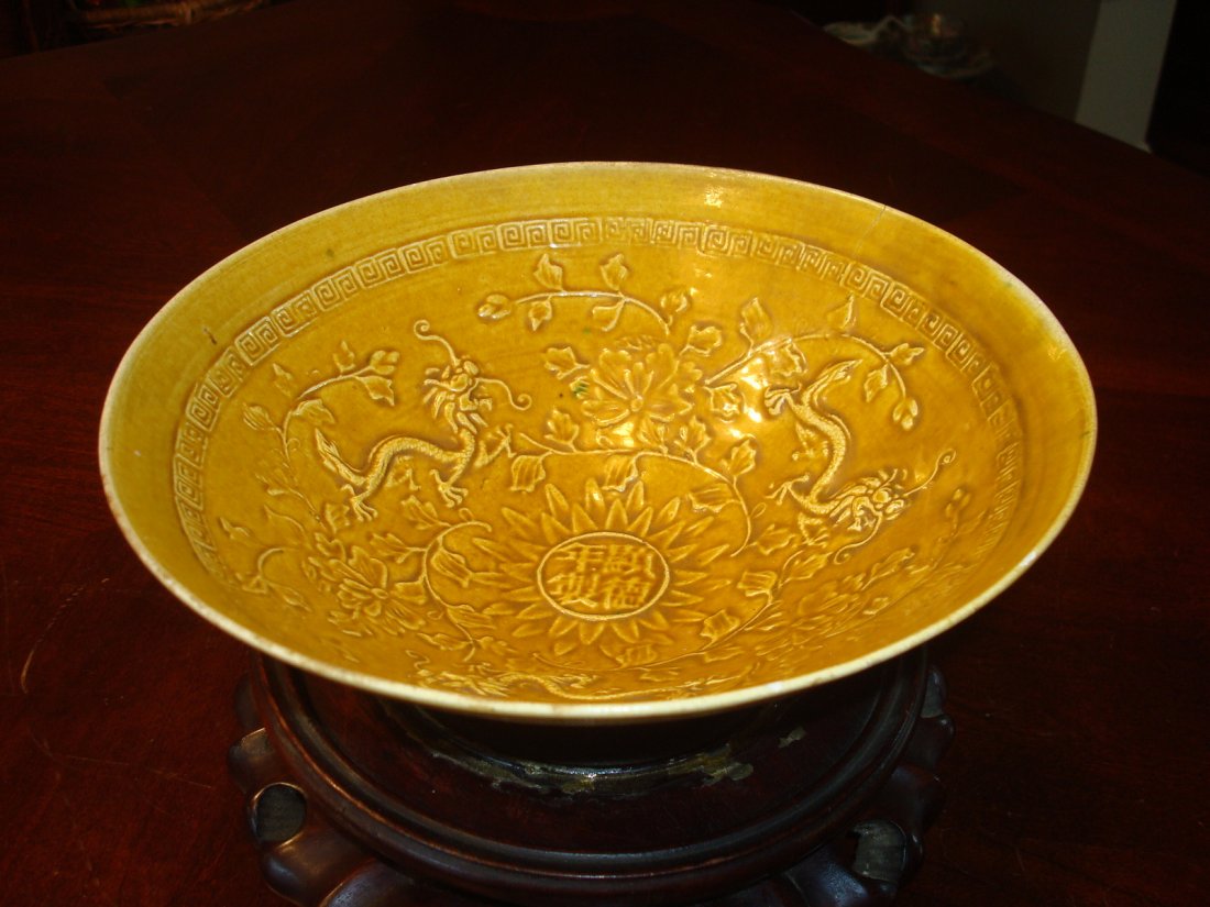 Antique Chinese Yellow Glazed Dragon Egg Shell Bowl: Antique Chinese Yellow Glazed Dragon Egg Shell Bowl, Marked on at the center. 7 3/4" Dia. 2 3/4" H. 3/4" hairline on top rim Providence: American Asian Art Gallery