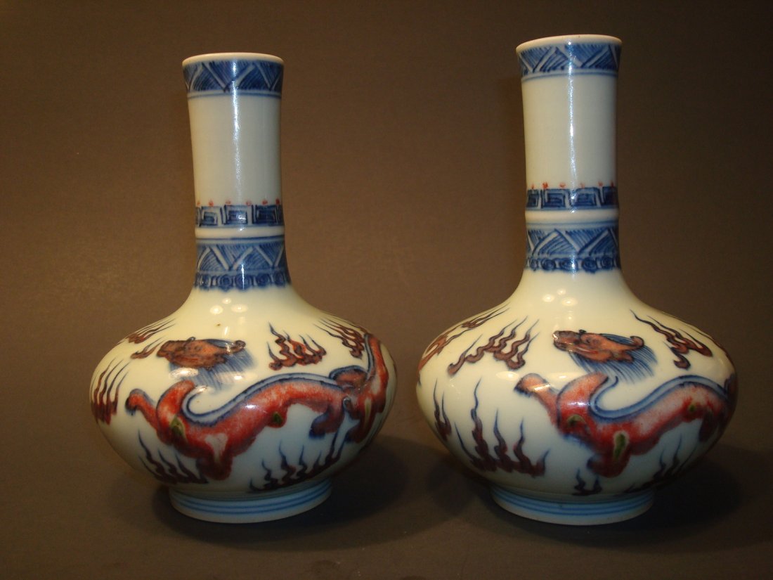 Antique Pair Chinese Dragon Bottles, Qianlong Mark. 6": Antique Pair Chinese Dragon Bottles, Qianlong Mark and probably period. 6" H. One bottle with a tiny chip on top rim Provenance: American Asian Art Gallery