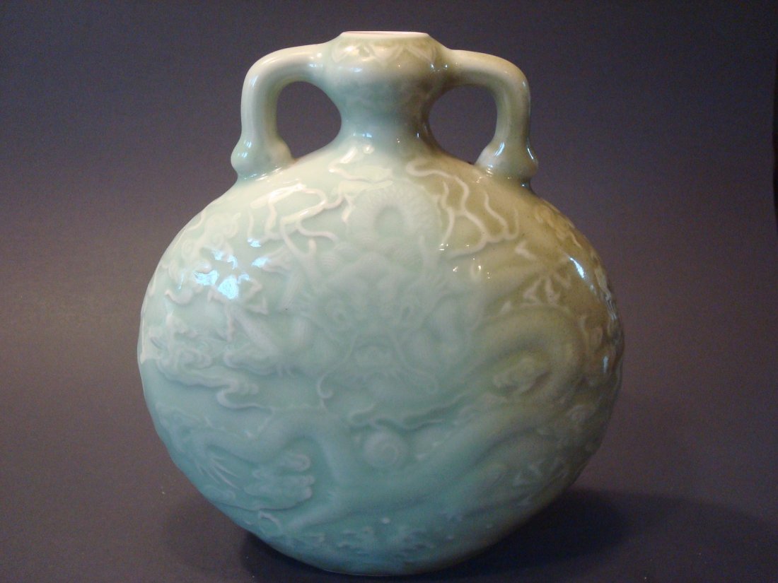 Antique Chinese Celadaon Dragon Bottle with two: Antique Chinese Celadaon Dragon Bottle with two handles, Qianlong mark. 8" H. Provenance: American Asian Art Gallery