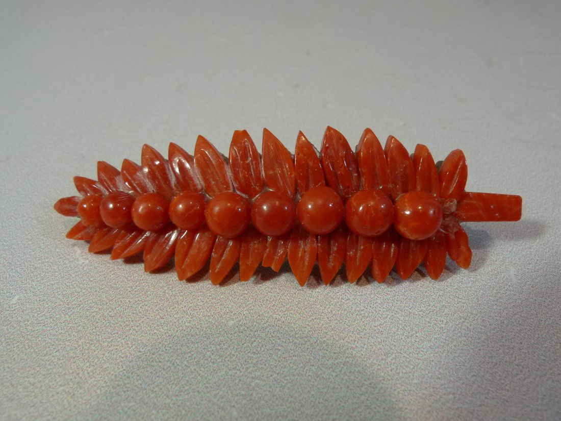 ANTIQUE CHINESE RED CORAL & ABALONE PIN: CHINESE RED CORAL & ABALONE PIN. 6 CM LONG. 9 GRAMS.