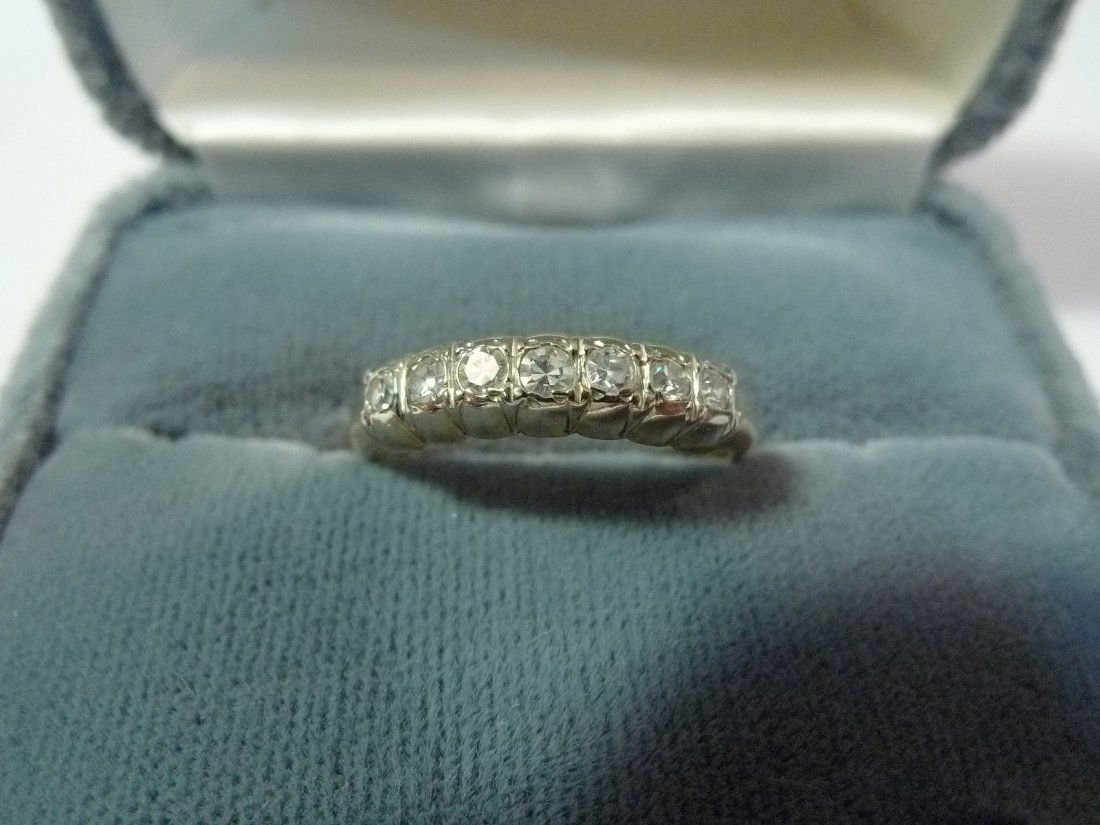 14K SOLID GOLD NATURAL DIAMOND WEDDING RING BAND 0.5: 14K SOLID GOLD NATURAL DIAMOND WEDDING RING BAND 0.5 CARAT 2 GRAMS. 7 GRADUATED NATURAL DIAMOND ROUGHLY 0.5 CARAT TOTAL WEIGHT. SIZE 6.5 PROVENANCE - POTOMAC MD ESTATE