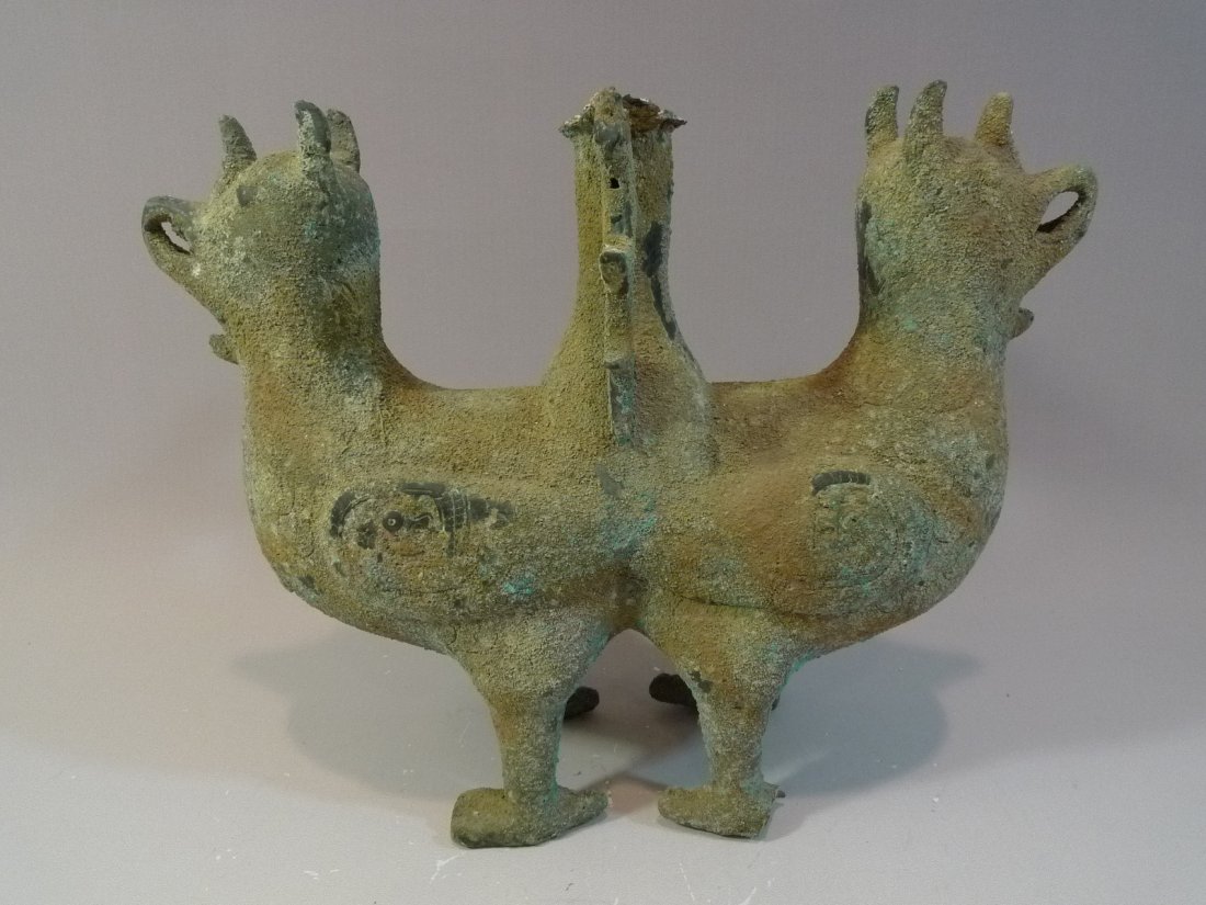 ANTIQUE CHINESE BRONZE STAND - SHANG OR ZHOU DYNASTY: ANTIQUE CHINESE BRONZE STAND - SHANG OR ZHOU DYNASTY 1000 BC. WAS THE FOOT OF A LARGER PIECE. PROVENANCE - WASHINGTON DC ESTATE