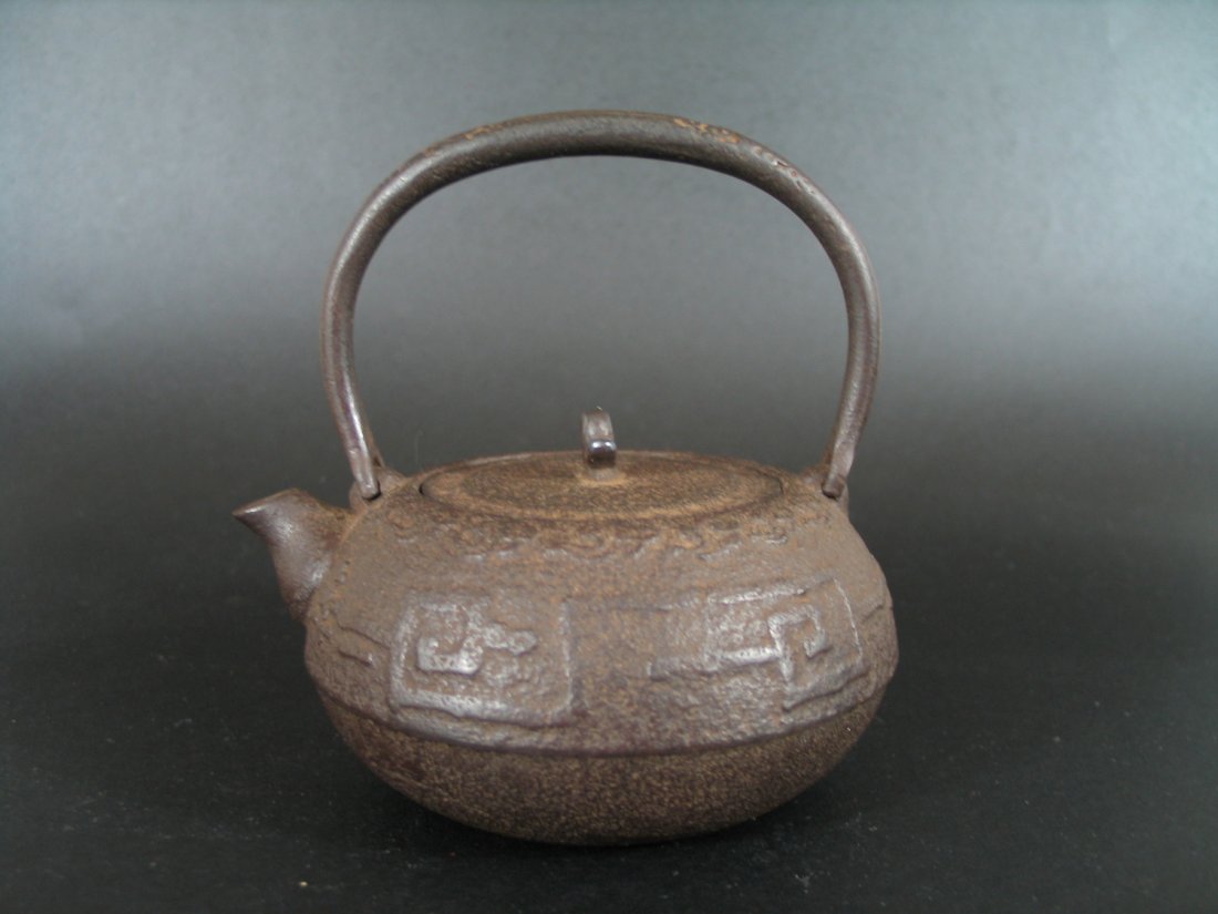 Antique Japanese Iron Teapot, Maker's mark on the body.: Antique Japanese Iron Teapot, Maker's mark on the body. Total Ht: 5 1/4 inches.