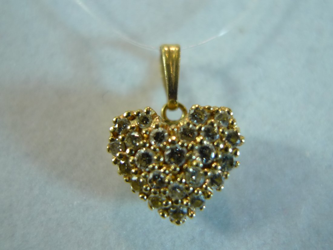14K SOLID GOLD DIAMOND HEART PENDANT: 14K SOLID GOLD DIAMOND HEART PENDANT. 2 GRAMS 12X12MM. ALL NATURAL DIAMOND