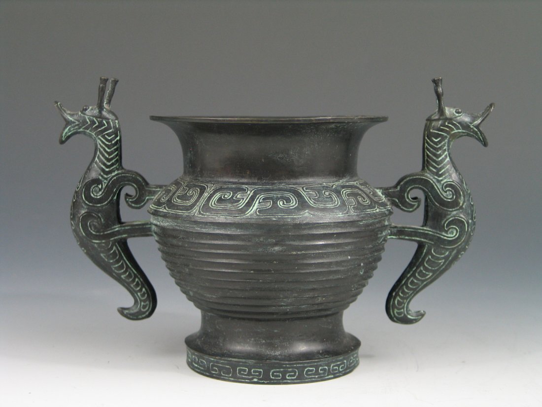 Antique Chinese Bronze Incense Burner: Antique Chinese Bronze Incense Burner. Ht: 4 1/4 inches. Diameter: 4 1/4 inches.