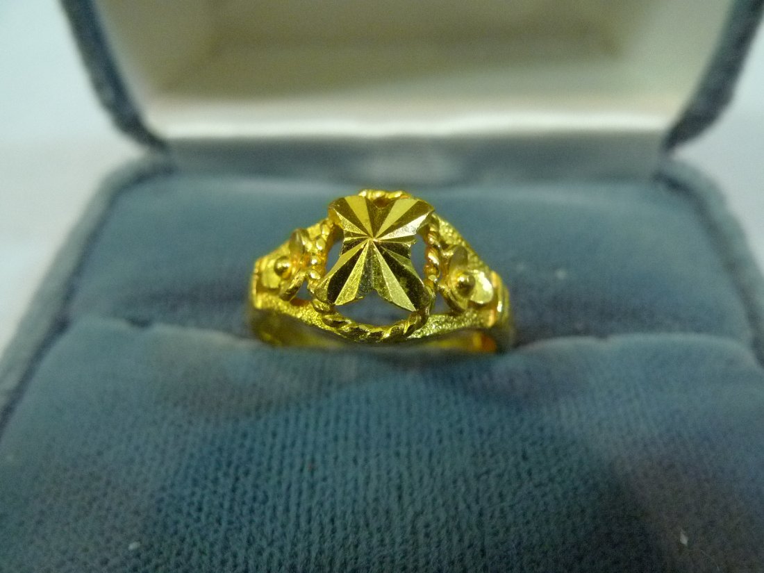 24K GOLD CHINESE RING 5 GRAMS: 24K GOLD CHINESE RING. SOLID 9999 GOLD. ADJUSTABLE SIZE. 5 GRAMS