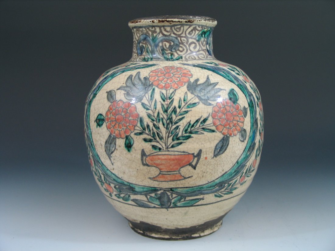 Antique Islamic Porcelain Jar: Antique Islamic Porcelain Jar. Ht: 10 inches.