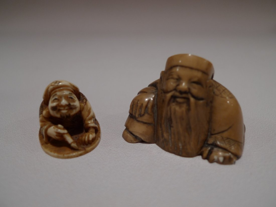 TWO JAPANESE CARVED IVORY NETSUKE MEIJI PERIOD: TWO JAPANESE IVORY NETSUKE MEIJI PERIOD. SIGNED ON THE BOTTOM. 2" & 1.25"
