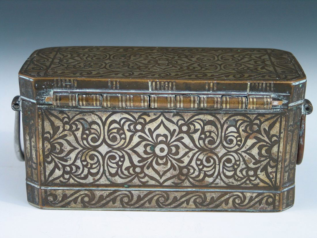 Antique Islamic Bronze Teacaddy with Silver Inlaid: Antique Islamic Bronze Teacaddy with Silver Inlaid Patterns. Ht: 3 1/2 inches. L: 7 1/2 inches. Wd: 3 1/2 inches. Wt: 2070 grams.