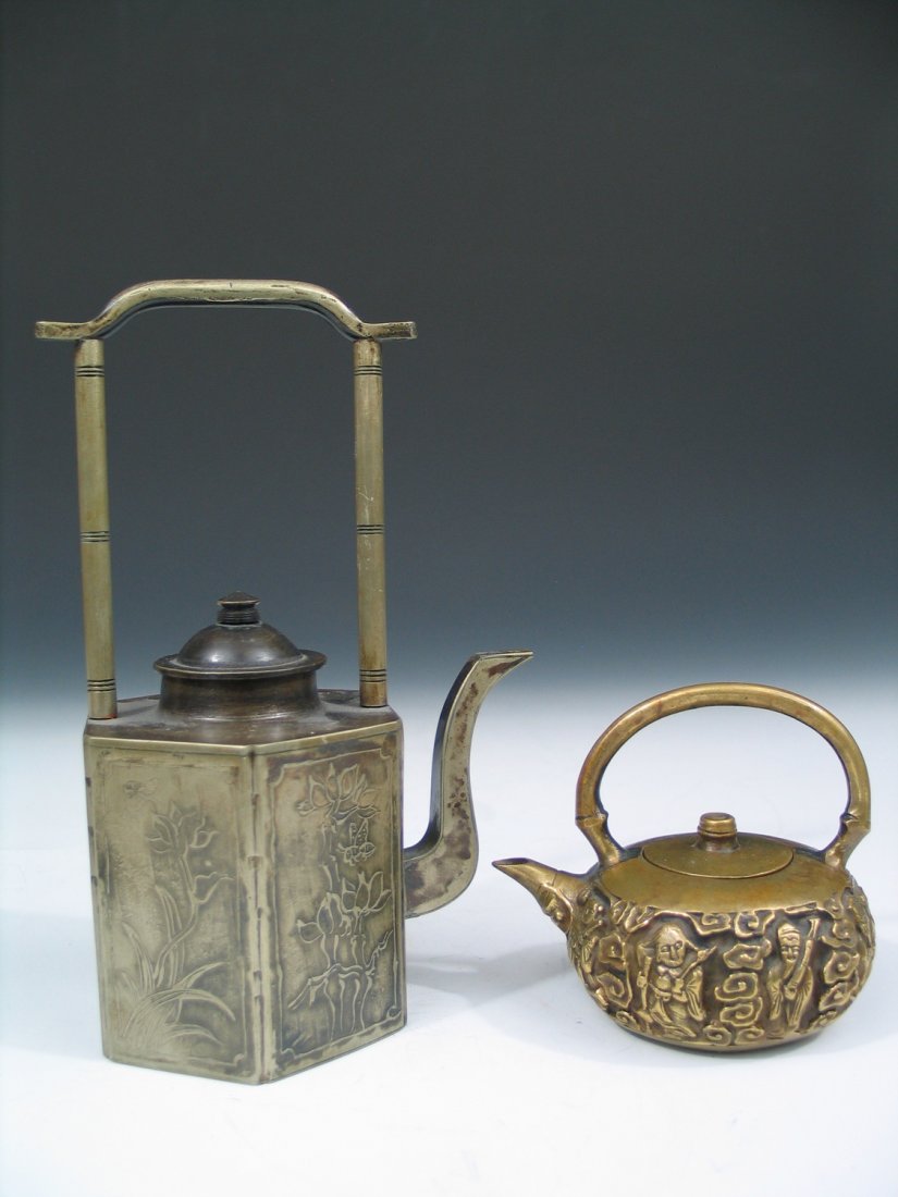Two Vintage Chinese Copper Teapots.: Two Vintage Chinese Copper Teapots. Ht: 18 cm and 8 cm with handles.