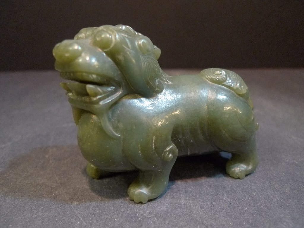 ANTIQUE CHINESE CARVED CELADON JADE FOO DOG 19TH: ANTIQUE CHINESE CARVED CELADON JADE FOO DOG 19TH CENTURY. 8.5 CM WIDE. PROVENANCE - WASHINGTON DC ESTATE
