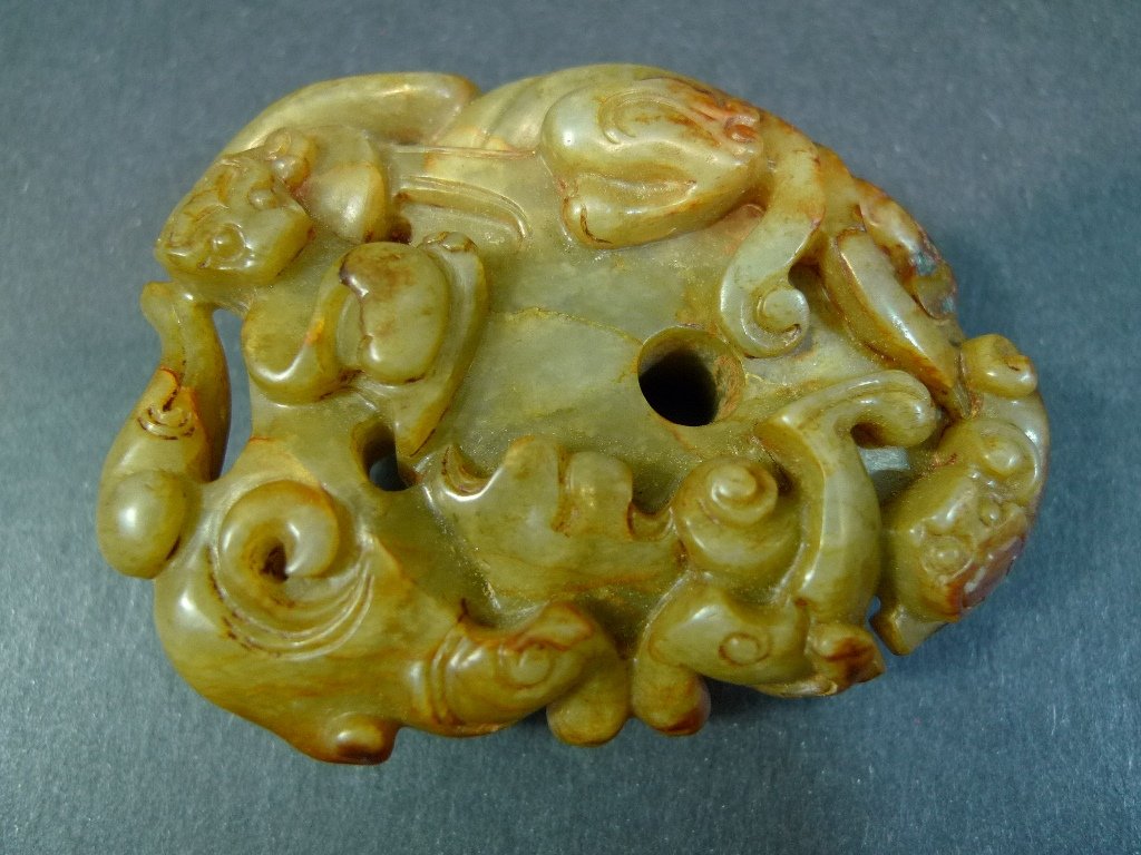 ANTIQUE CHINESE HETIAN JADE BI - HAN DYNASTY: ANTIQUE CHINESE HETIAN JADE BI - HAN DYNASTY. 7 CM WIDE. 105 GRAMS. THE DR. HELGA WALL-APELT COLLECTION.