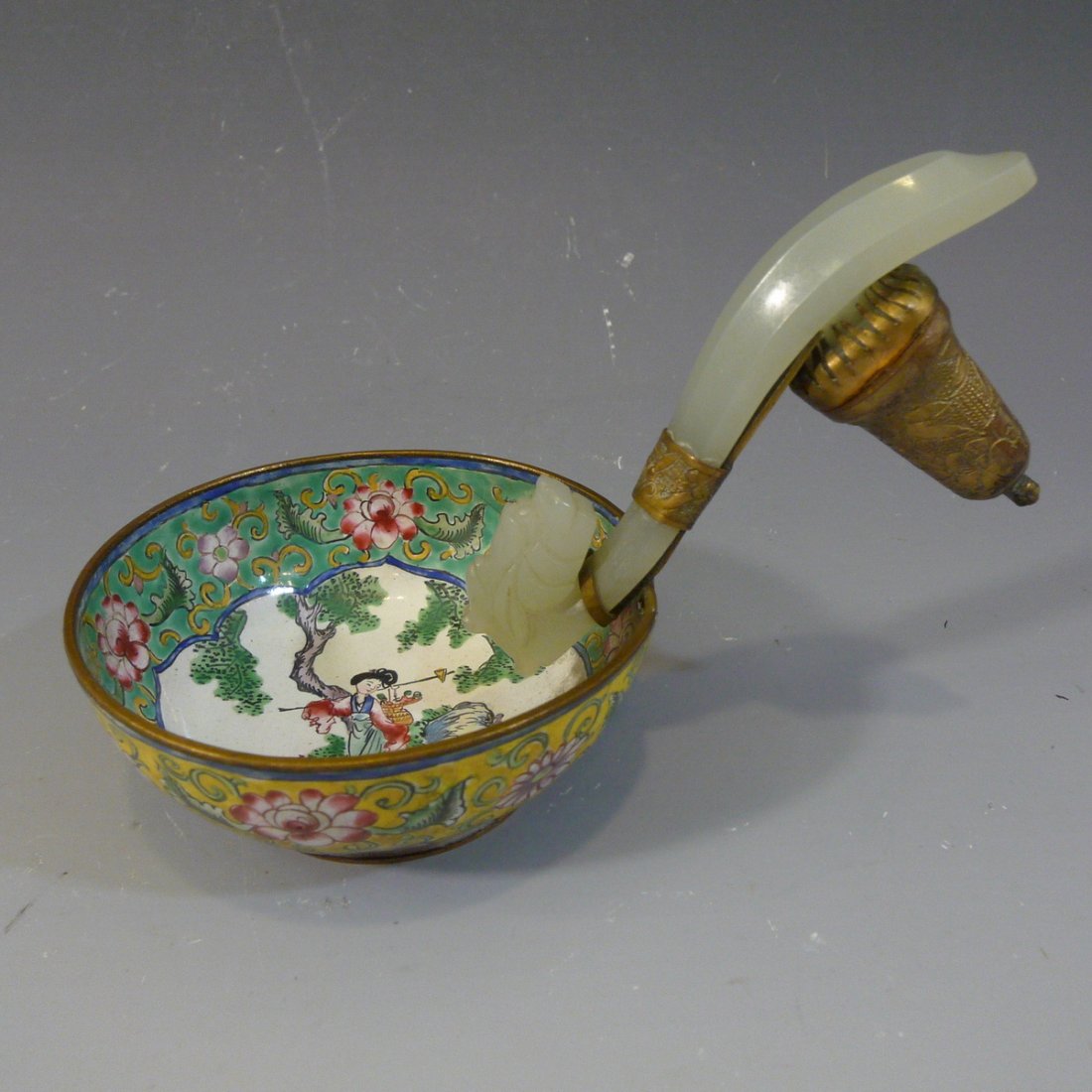 ANTIQUE CHINESE HETIAN WHITE JADE BELT BUCKLE 18TH: NO RESERVE ON THIS LOT! ANTIQUE CHINESE HETIAN WHITE JADE BELT BUCKLE 18TH CENTURY. USED IN A REPUBLIC PERIOD ENAMEL BOWL. JADE BUCKLE BY ITSELF IS 9 CM LONG AND CAN BE REMOVED FROM THE BOWL IF YOU DE