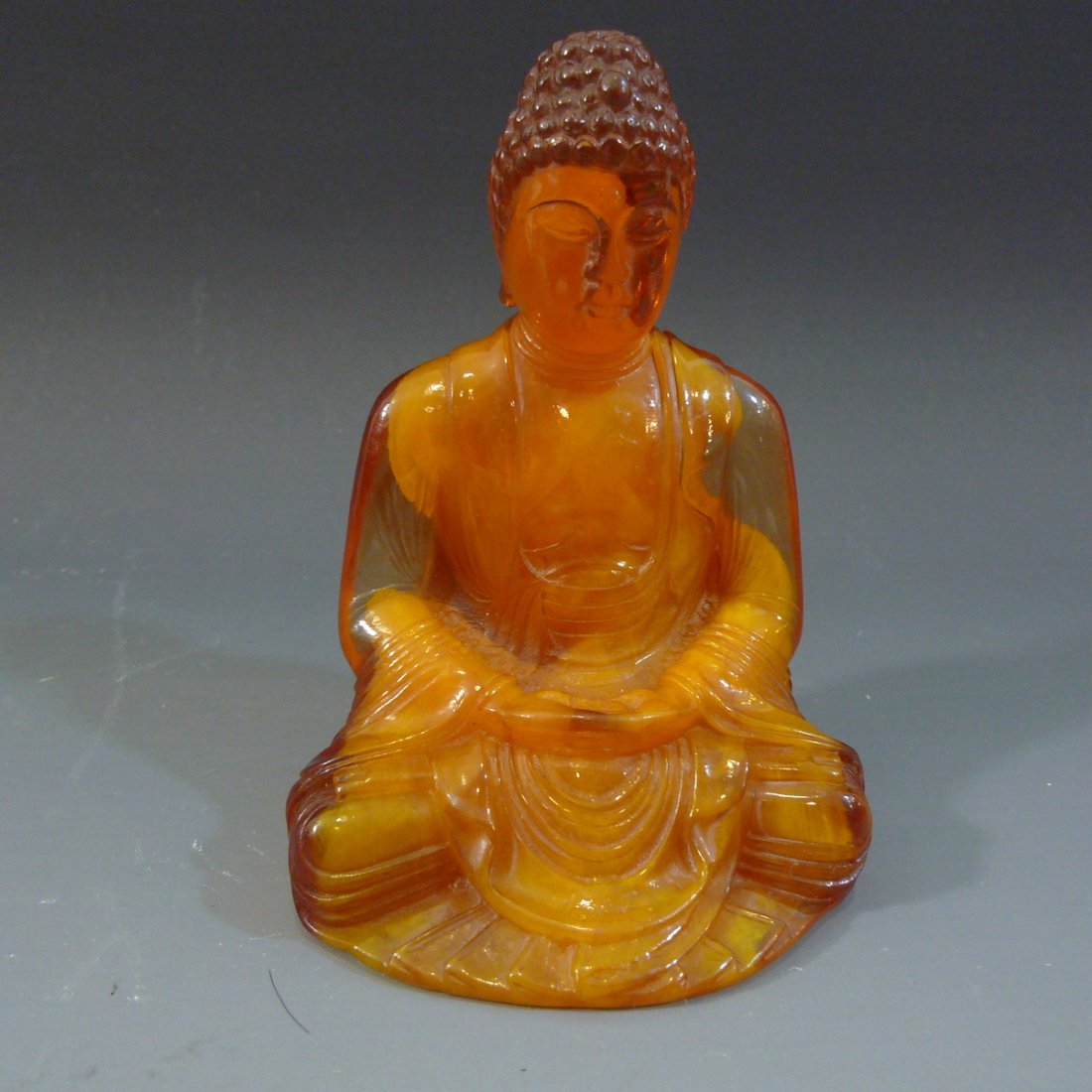 ANTIQUE CHINESE AMBER COLOR BUDDHA (1 of 9)