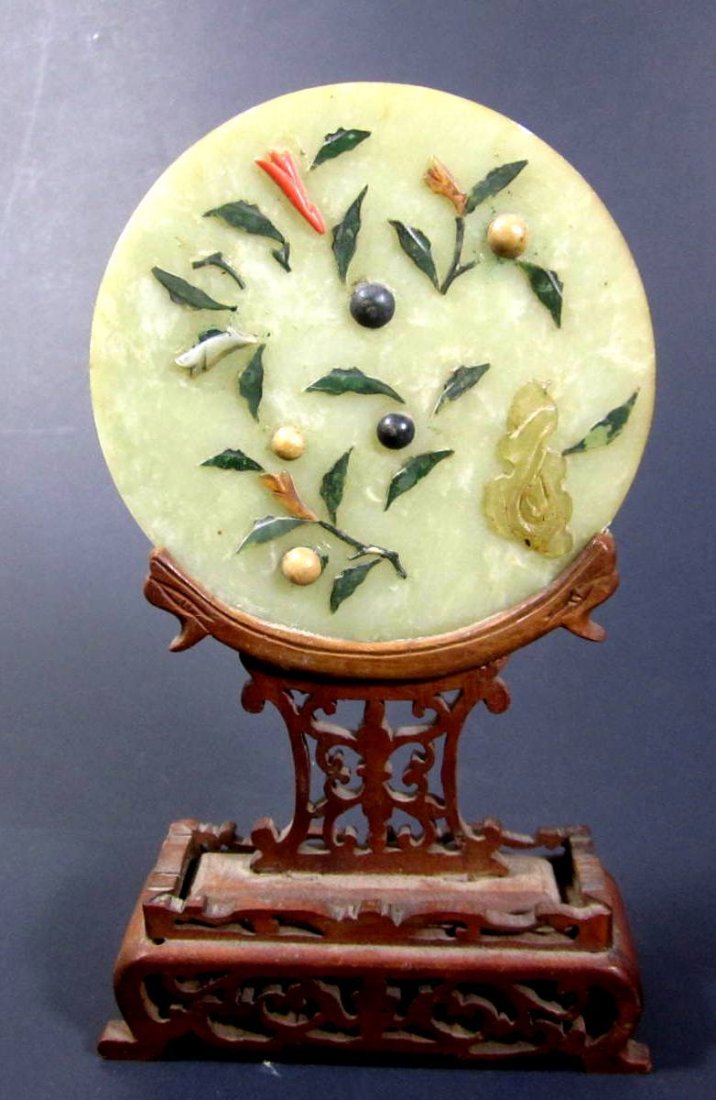 MAGNIFICENT JADE CIRCULAR CARVING DEPICTING FLOWERS (1 of 5)