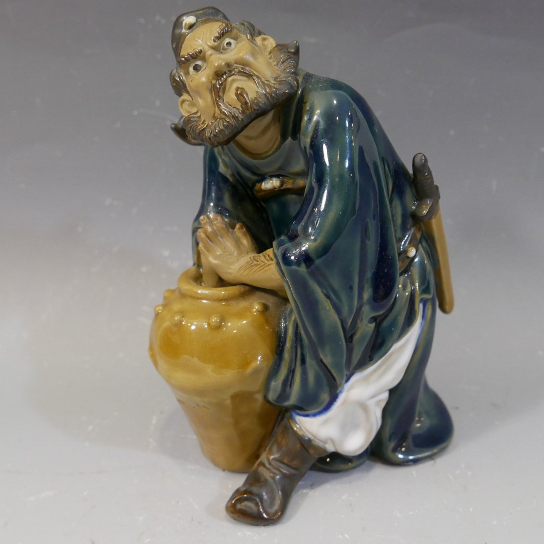 CHINESE SHIWAN POTTERY FIGURE OF A MAN (1 of 7)