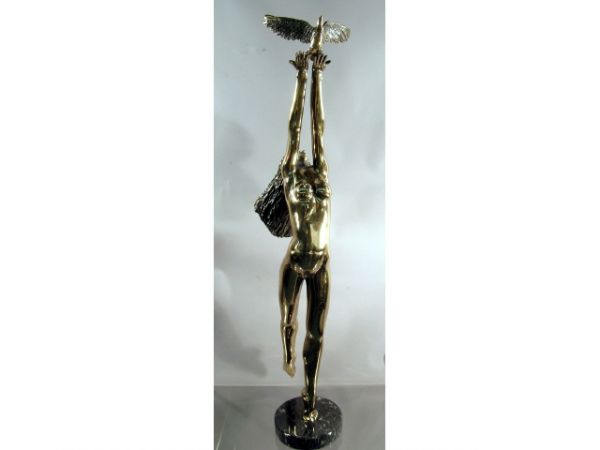 Tom Bennett Bronze Nude Dream Catcher: Title: Dream Catcher. Highly polished bronze female nude with outstretched hands and flowing hair, by Tom and Bob Bennett. 42" H x 9" W x 7" W, with bronze base having a faux marble finish 43.5" H. Si