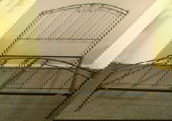 King Size Iron Bed Fine Quality: Antique style high quality reproduction king size iron bed, in a pewter gray finish with coppery highlights. Purchased from the Heirloom Bed Co., San Antonio TX, and manufactured by Brass Beds of Virg