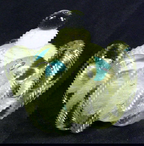 C. Ries 1976 Art Glass Perfume: CHRISTOPHER RIES: Crown shaped art glass perfume bottle, clear ball center with yellow, and blue flecked striations, encompassed with clear applied loops. Stem of stopper is missing. Measures 3.25" H