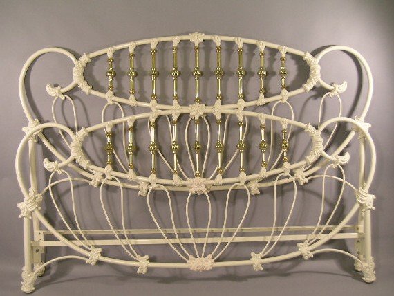 Brass and Iron King Size Bed: Victorian style brass and white painted iron king size bed. Uses a regular mattress frame, not included ( readily available at mattress and furniture stores for about $30 - 40) Measures 78" W x 54" H.