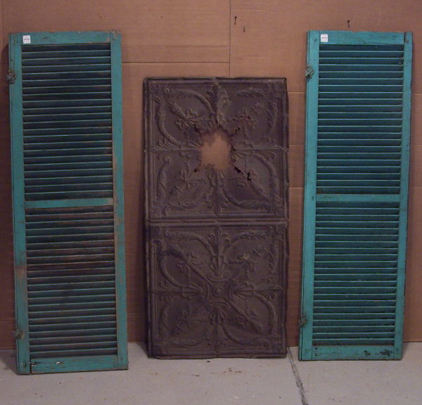 Pair of Turquoise Shutters and Stamped Tin: Shutters are the real deal: old. 18" W x 56" H with good half-hinge brackets. Stamped tin ceiling piece is 2 ft. x 4 ft. and has rust and perforations. P 172