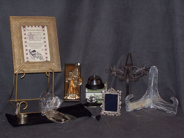 Desk Top Frames, Pen, Card Misc Lot: Chrome and Black with a little Gold: Two picture frames, two book holders/photo holders, one silver service bell, a pen and card tray, a black velvet bag make a great set up for your desk top or bookc