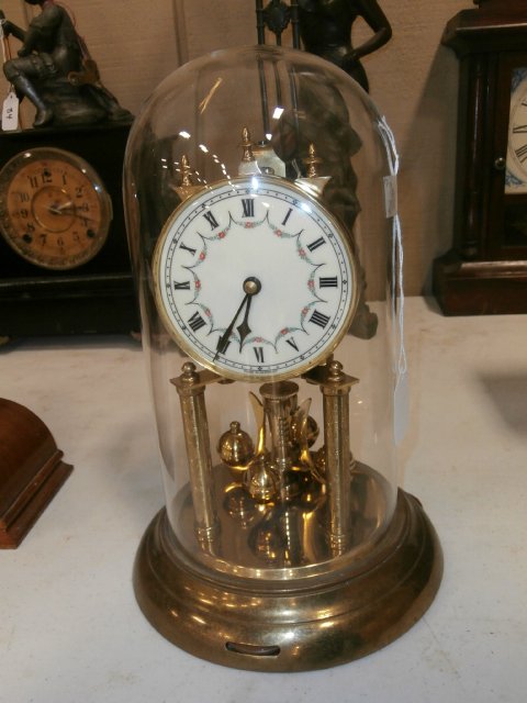 German Glass Dome Clock: German Glass Dome Clock, Base is Tarnished, has Adjusters, 12"x7 1/2", As Is