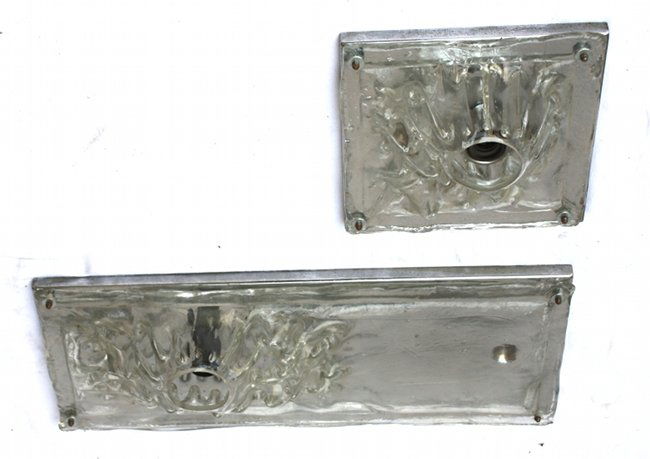 Angelo Brotto, Esperia, two wall lamps: Angelo Brotto, two wall lamps Polifemo. Esperia. Chromed metal, glass. Coppia di applique Angelo Brotto per Esperia modello Polifemo. Dimensioni: grande 72 x 30 cm, piccola 30 x 30 cm