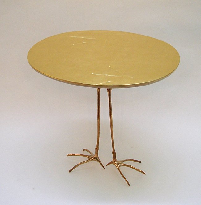 Simon Gavina, Oppenheim, table Traccia: Table. Ellictical plane with pure gold leaf. Fusion bronze legs. Oppenheim by M. Oppenheim, Traccia model. Prod. Simon Gavina 1932, riproduction on 1972. Dimensions: h 65, 68 x 53 cm. Piano ellittico