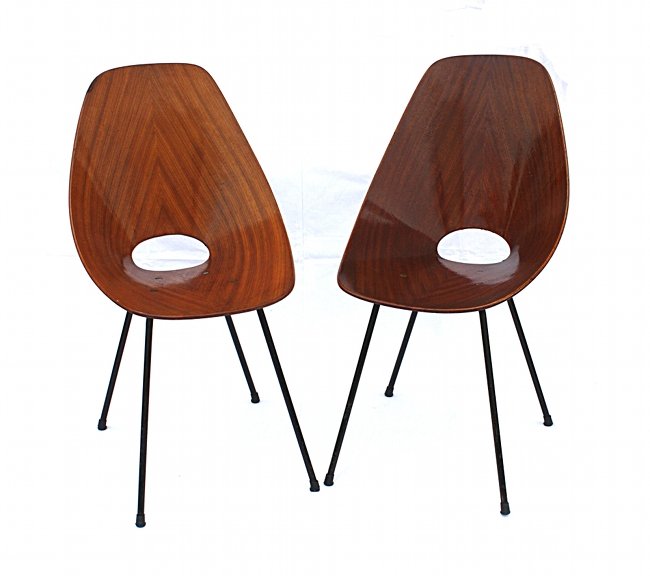 F.lli Tgliabue, two chairs Medea: Two chairs Medea. Curved wood, varnished metal. Fratelli Tagliabure, 1955. Litersture: Repertorio Gramigna. Due sedie Medea, fratelli Tagliabue 1955 Legno multistrato curvato, metallo verniciato Bibli