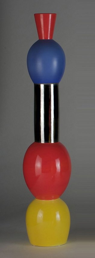 Alessandro Mendini, Superego, totem Metopa: A "Metopa" earthenware totem composed by five geometric elements, red, yellow, black and silver enamels. From a limited edition of 10 pieces. Signed. HEIGHT. 70 7/8 IN. Alessandro Mendini, Superego, t
