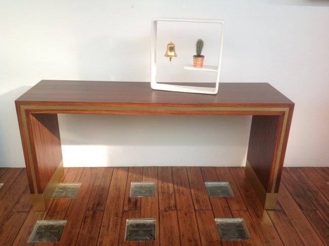 Studio Superego. Amazonian, Consolle: Italian manufacture. Amazonian consolle. Rosewood and brass.Consolle amazzonicaPalissandro e ottone. Dimensioni: 170x50 h 70 cm