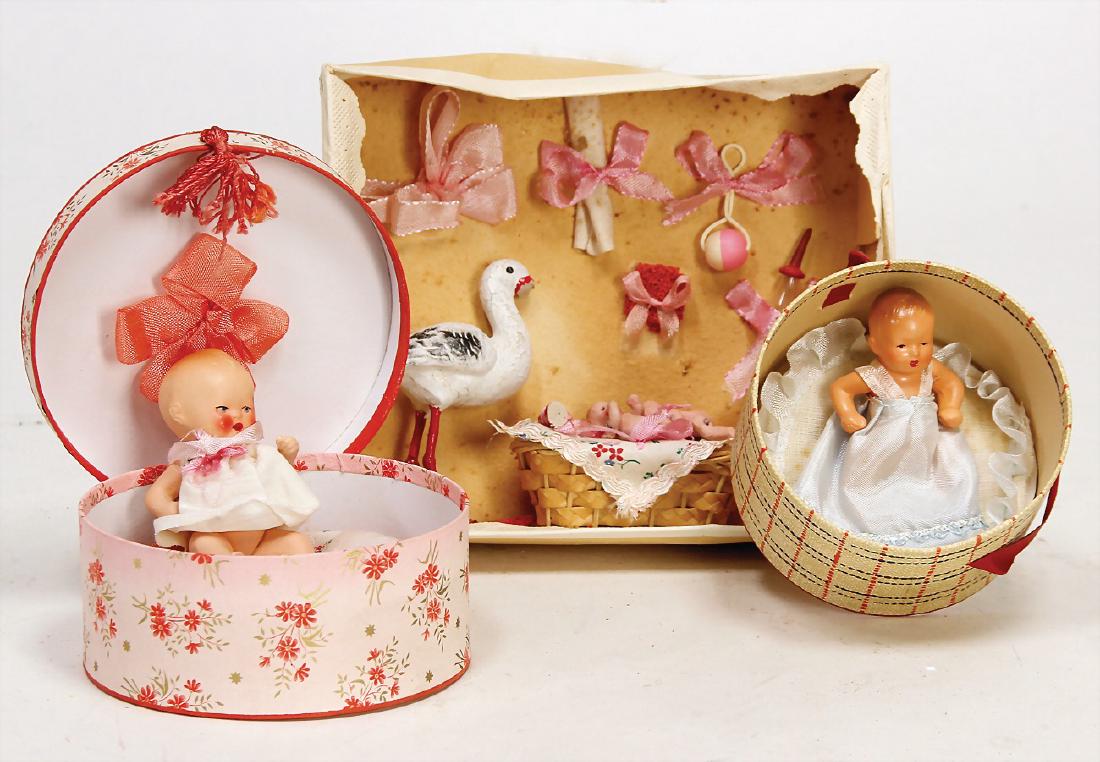 3 Orig.-Schachteln mit kl. Masse-Puppen u. (1 of 1)