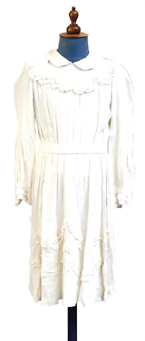 child dress, white, size c. 152, with Peter: child dress, white, size&nbsp; c. 152, with Peter Pan collar and frills, with belt, row of buttons on the reverse, the traces of usage are caused of old age, otherwise good condition German Descri