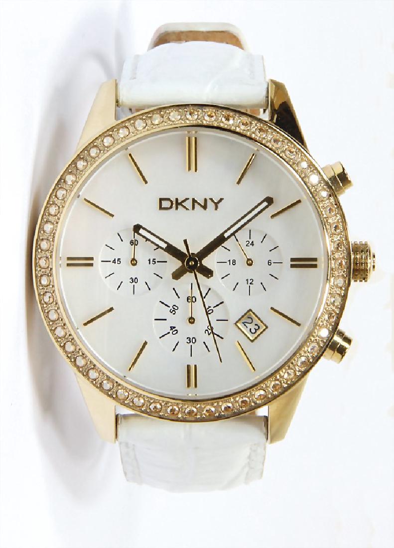 DKNY ladies watch, model: NY4844, gold coated stainless: DKNY ladies watch, model: NY4844, gold coated stainless steel, white leather watchstrap, clockface: mother-of-pearl, good condition German Description DKNY Damenuhr, Modell: NY4844, gold überzoge