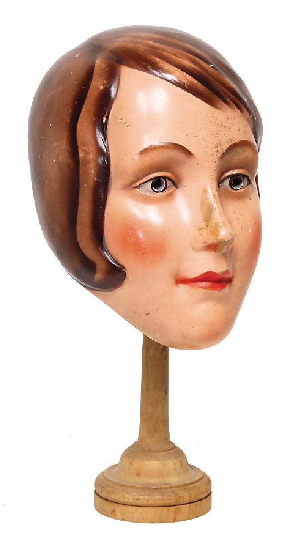 from the '20s, mass head, probably for a bust or: from the '20s, mass head, probably for a bust or mannequin, fine modelled nose and lips, nose was once afterwards glued, modelled pageboy style, handpainted German Description 20er Jahre Massekopf, wo