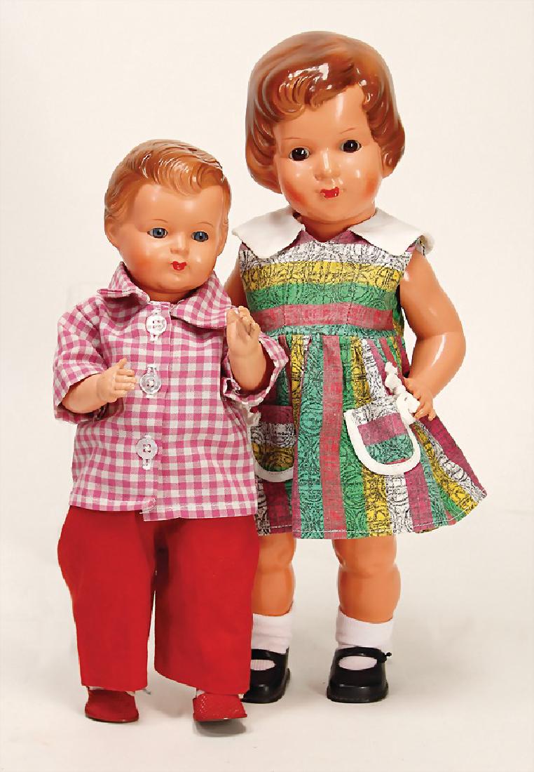 BRUNO SCHMIDT 2 Celluloid-Puppen, 1x Mädchen,: BRUNO SCHMIDT 2 Celluloid-Puppen, 1x Mädchen, braune fest eingesetzte Glasaugen, modell. Frisur, 37 cm, 1x Junge, gem. 33, blaue fest eingesetzte Glasaugen German Description BRUNO SCHMIDT 2 Cell