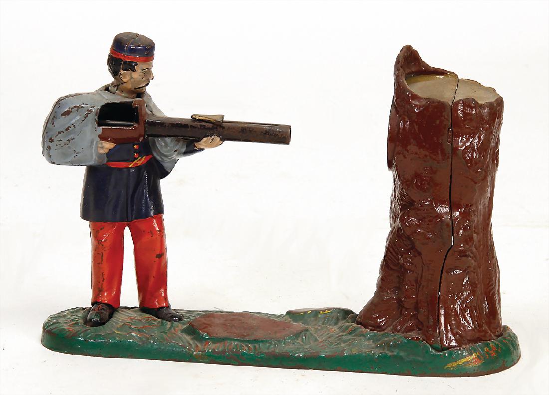 Money box, USA, man shooting on a ree, painted iron (1 of 1)