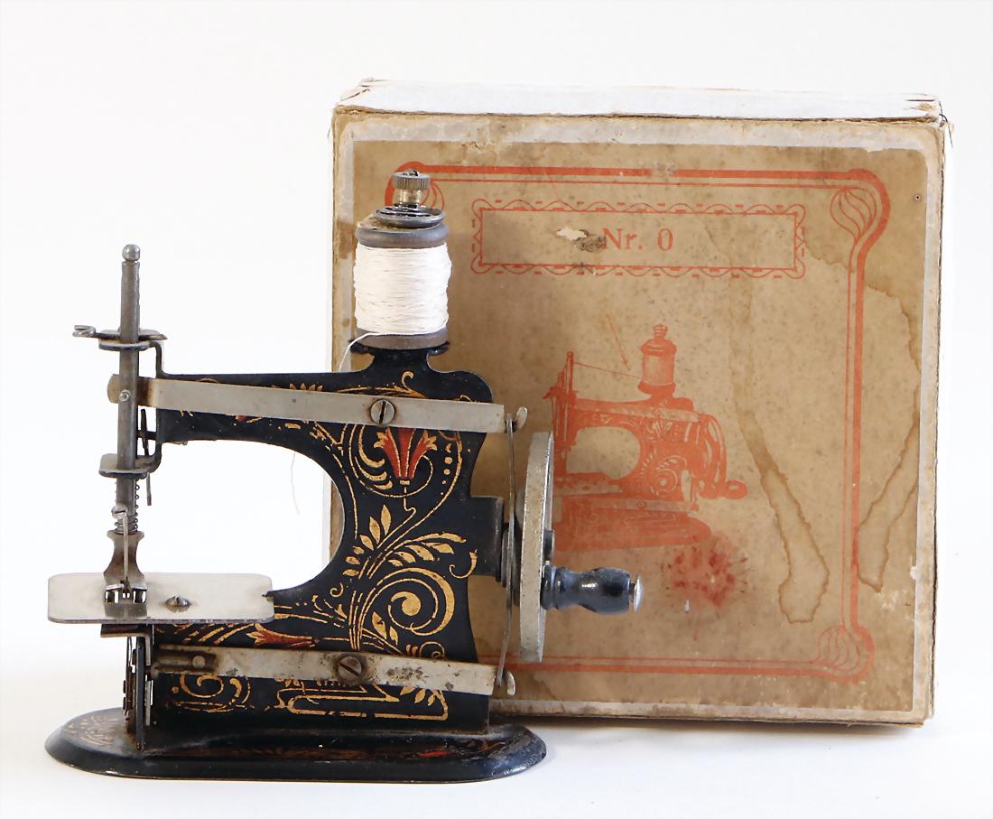 CASIGE sewing machine, No. 0, in original-box, (1 of 1)