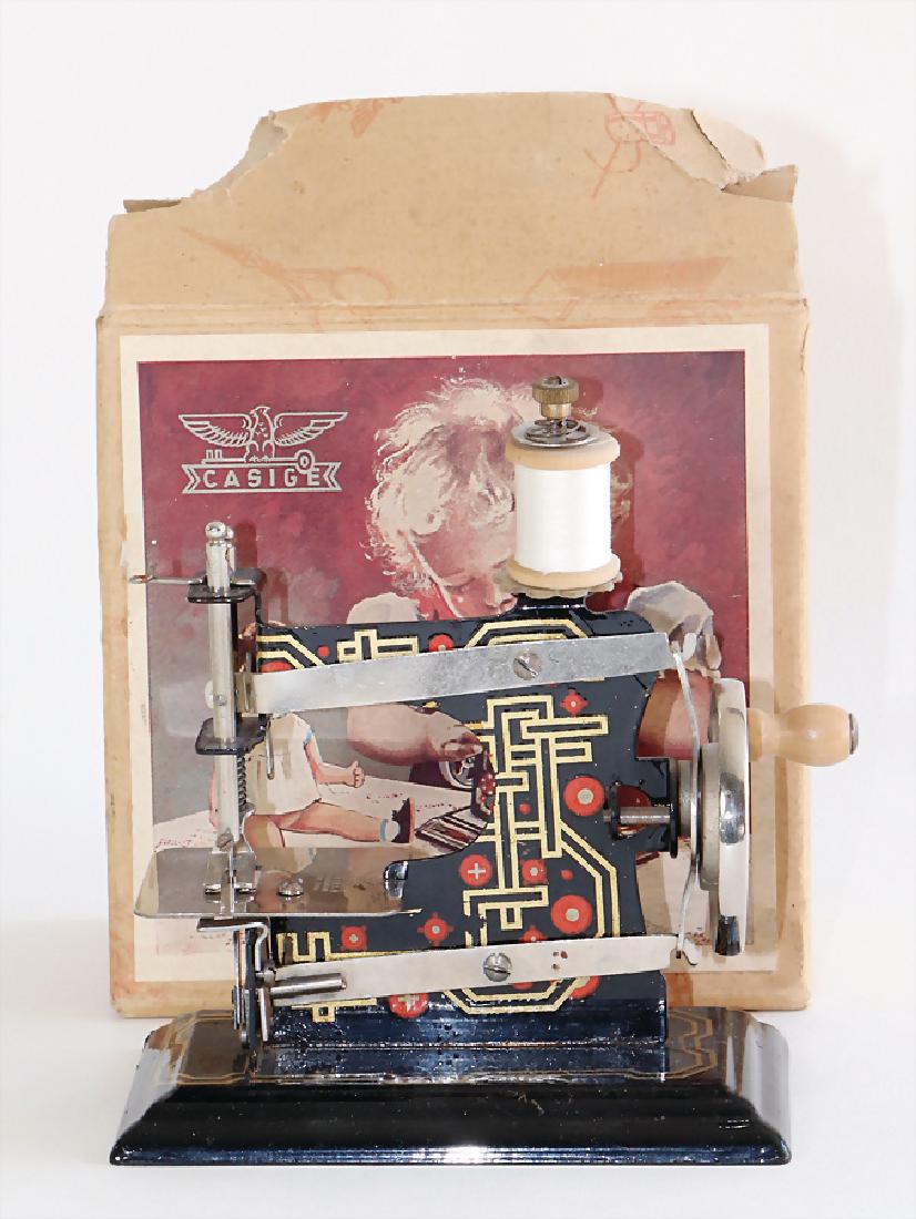 CASIGE sewing machine, number  0, rectangle base, (1 of 1)